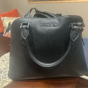 Michael Kors Adele large dome gunmetal black out. Good used condition.